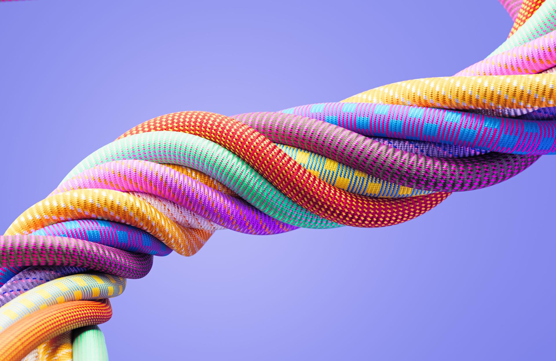 Colorful Paracords On Purple Background - Diversity And Multiculturalism Concept